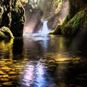 A waterfall in the middle of a river.