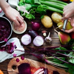 A table with vegetables and other foods on it